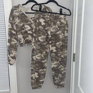 Matching two piece camo print joggers and cropped quarter zip hoodie